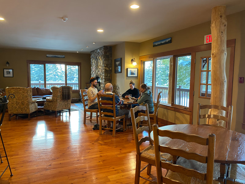 There is plenty of spots to sit and relax with friends and family in the great room at Vagabond Lodge